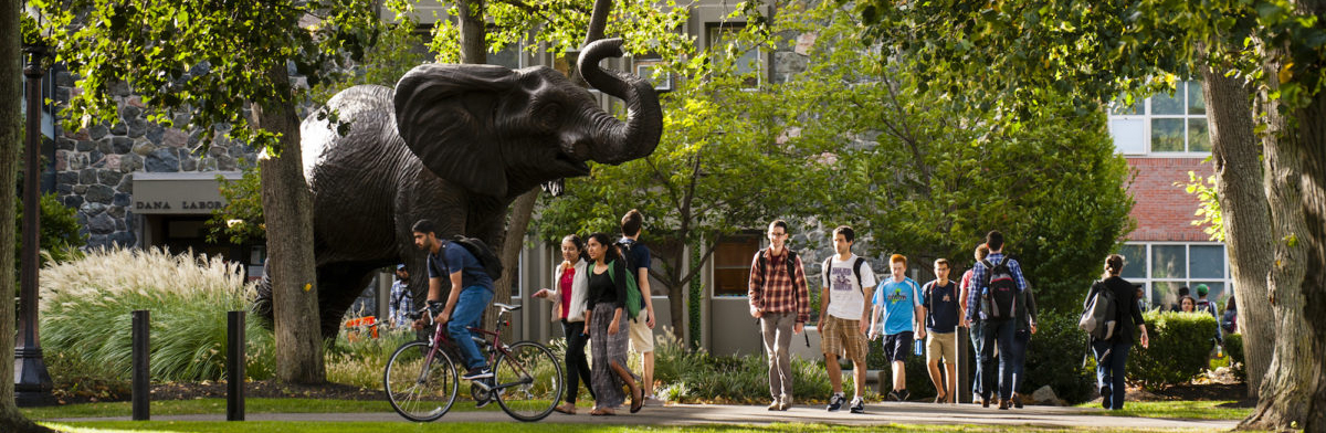 09/21/2015 - Medford/Somerville, Mass. - A view of the new Jumbo statue on the Academic Quad with students walking to and from class photographed on September 16, 2015. (Alonso Nichols/Tufts University)